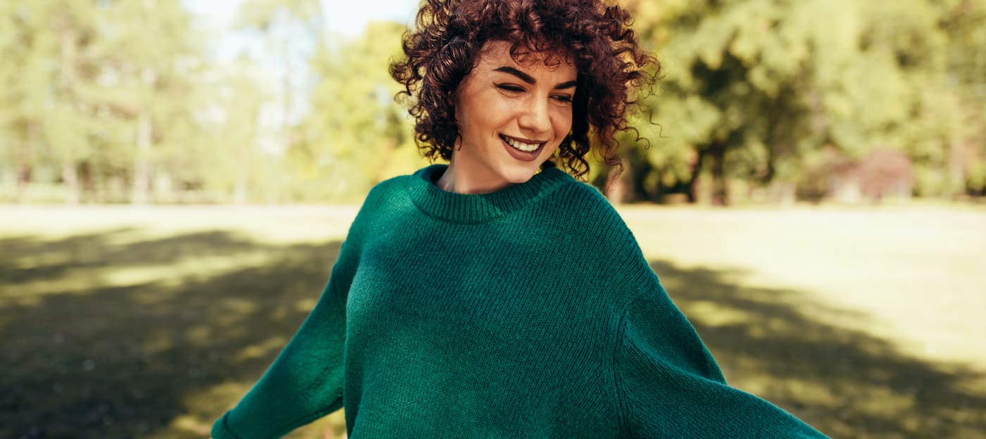 Woman in a green sweater